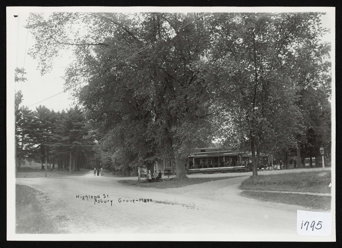 View at Asbury Grove, So. Hamilton, Mass, looking down Highland St. showing electric street car 3023 at the Grove station, also popcorn wagon