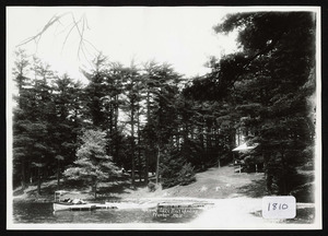 Early view of Perkin's boat landing and pleasure boats and camp from Idlewood Lake, Wenham, Mass., showing early camp