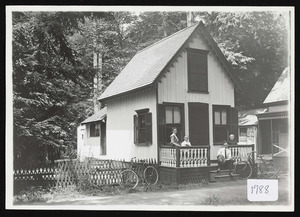 Family on porch of cottage, Asbury Grove, circa 1910