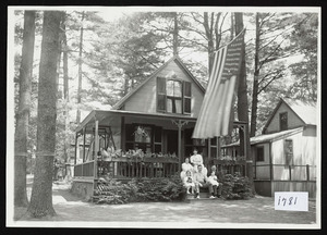 Family posing on steps of cottage, Asbury Grove, circa 1910