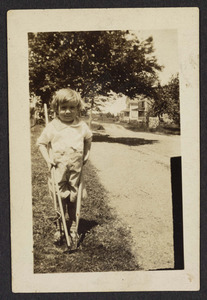 Child with garden tools