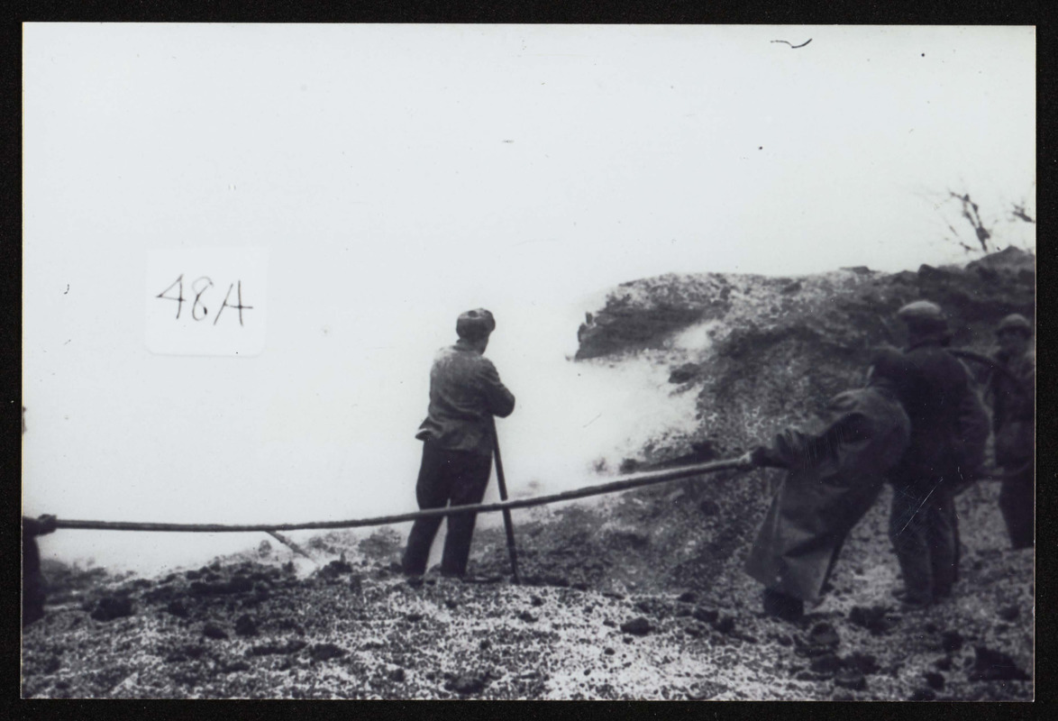 Showing the devastation of the March 1910 fire, probably a pile of coal that burned for days, the yard of Moynihan's Lumber and Coal Co.