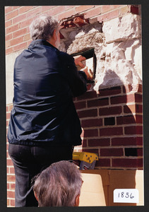 Butch Crosbie, Hamilton Historical president removing time capsule at old Hamilton High School, built 1931