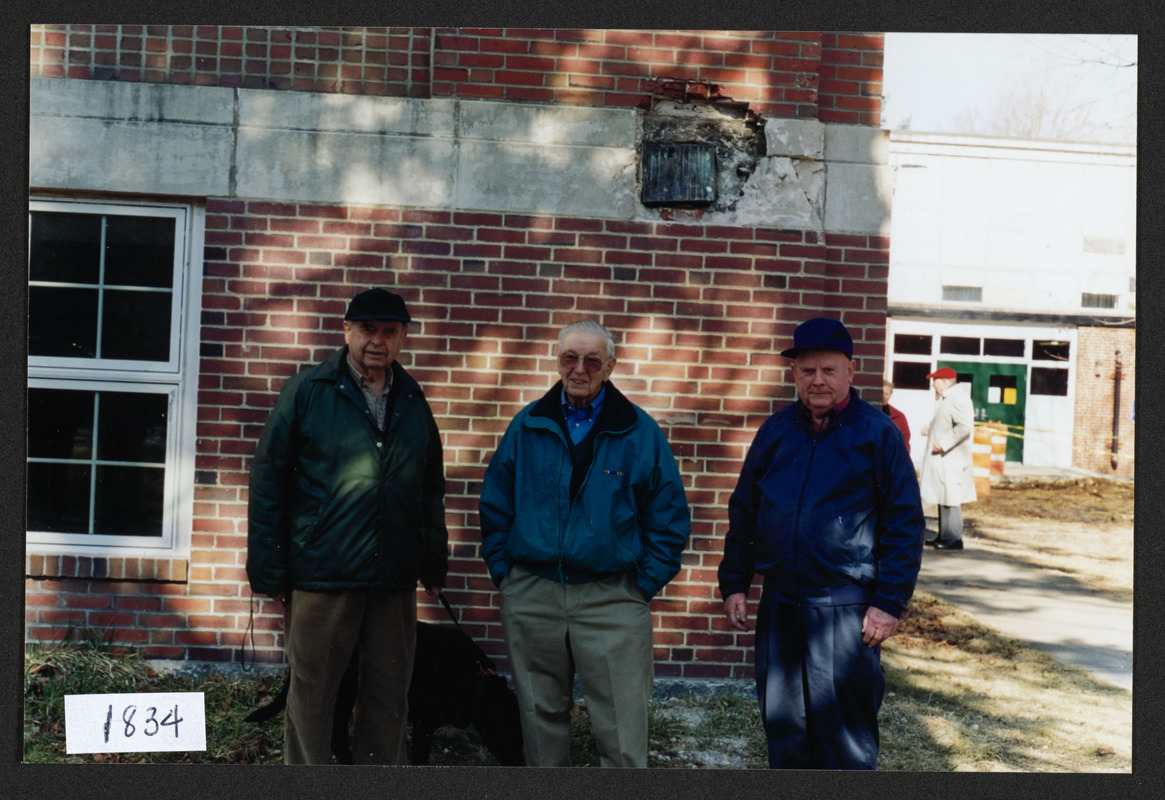 Albie Dodge, Wendall Day, pictured at corner stone of old high school, time capsule above heads