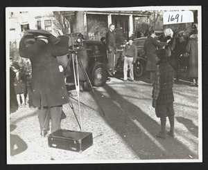 Photographer setting up to record to reenactment trek to Ohio, 1937