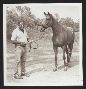 Myopia's horse stable attendent and trainer, August 1979