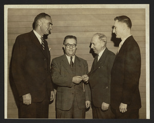 Forrester Clark, Larry Stone, Finlay MacDonald, Morely Piper, turning over keys to Cutler School