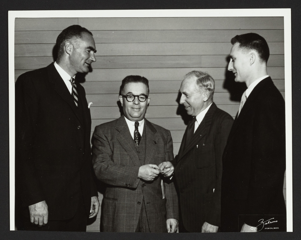 Forrester Clark, Larry Stone, Finlay MacDonald, Morely Piper, turning over keys to Cutler School