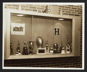 Trophy case outside the gym in the Hamilton High School, 1950s