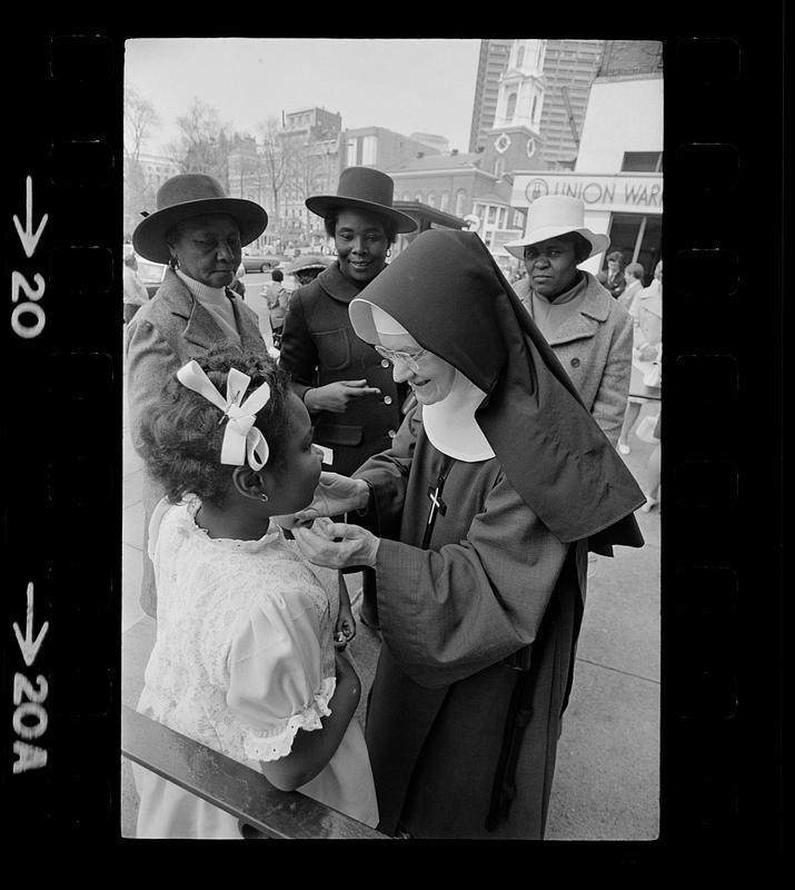 Nun greets black girl on Easter Day, Boston