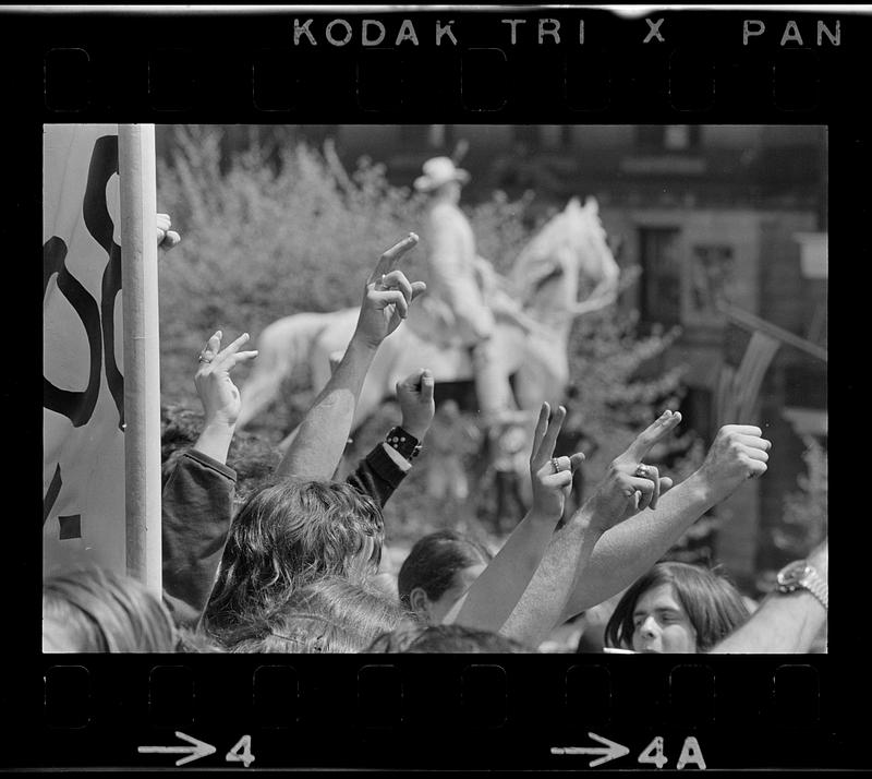 Angry fists at Kent State Massacre rally at State House, Boston