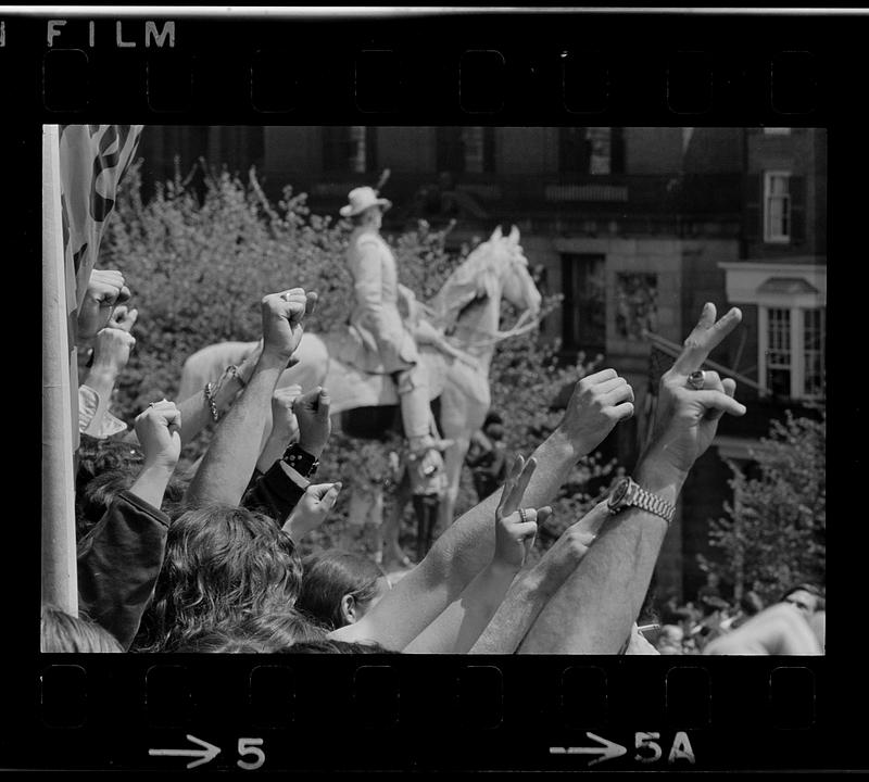 Angry fists at Kent State Massacre rally at State House, Boston