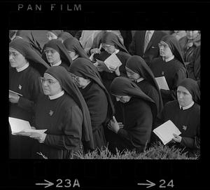 Nuns pray at Cardinal Cushing funeral, Milton