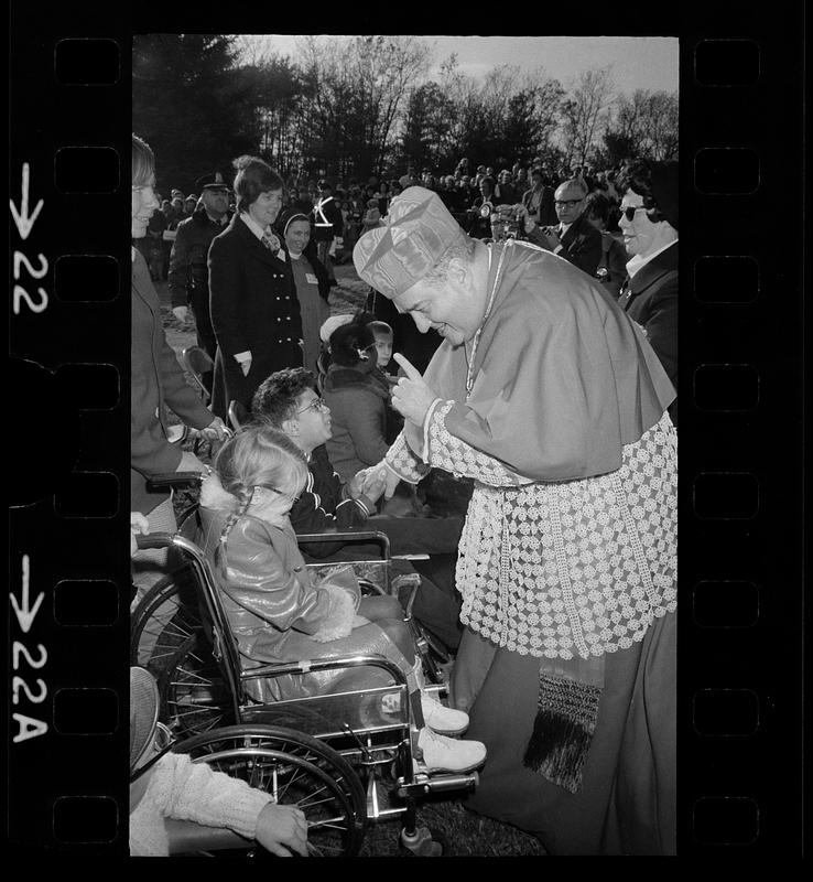 Cardinal Medeiros greets crippled children, Brighton