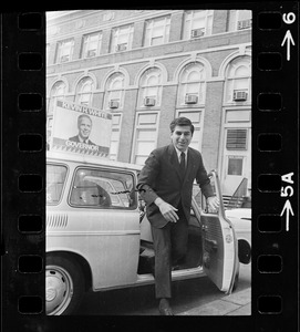 Michael Dukakis emerging from Kevin White campaign car outside Massachusetts General Hospital