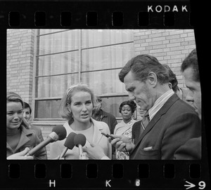 Mrs. Kathryn White (right) and sister Nancy Galvin talk to newsmen after their visit to Mayor Kevin White yesterday at Massachusetts General Hospital