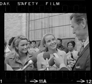 Mrs. Kathryn White (right) and sister Nancy Galvin talk to newsmen after their visit to Mayor Kevin White yesterday at Massachusetts General Hospital