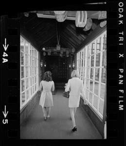 Unidentified woman and Kathryn White at aquarium