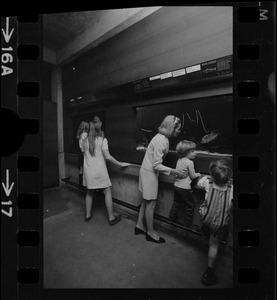Kathryn White with her children at aquarium