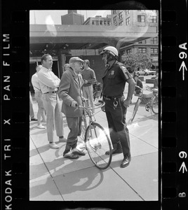John Saltonstall, Dr. Paul Dudley White, and police officer during 5-mile ride from Boston Common to Jamaica Pond