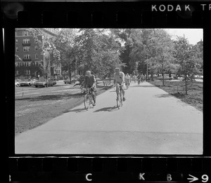 Dr. Paul Dudley White leads bicyclists from Boston Common on 5-mile ride