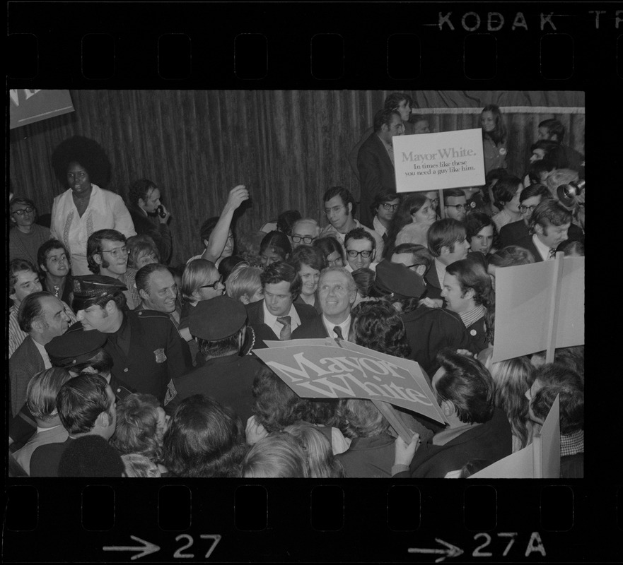 An obviously happy Mayor Kevin H. White of Boston stands amidst his jubilant campaign workers