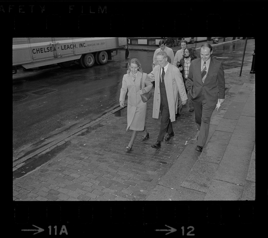 Boston Mayor Kevin White and Kathryn White walking to polling station for mayoral election