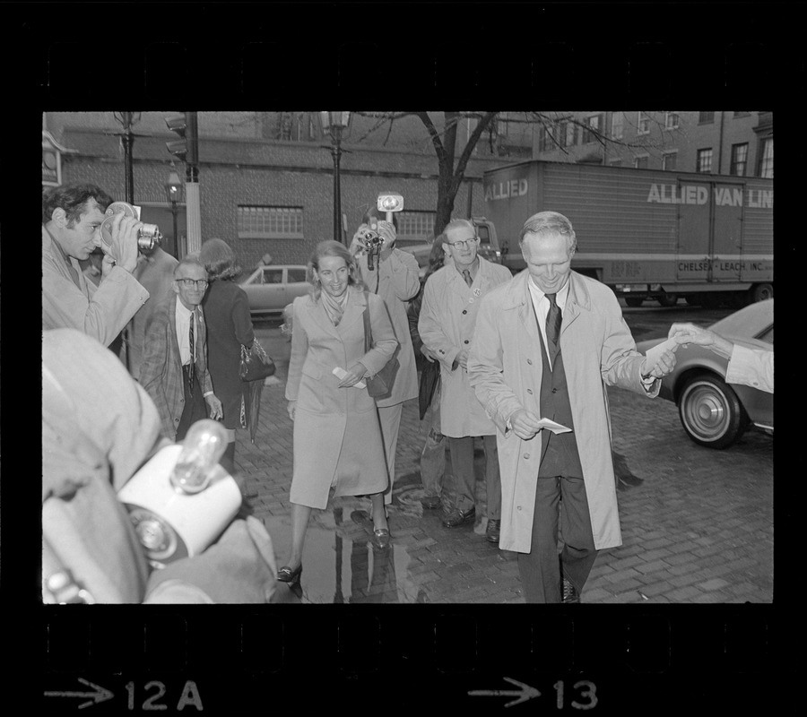 Boston Mayor Kevin White and Kathryn White walking to polling station for mayoral election