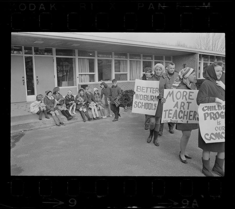 Striking Woburn teachers on picket line at Malcolm S. White Elementary