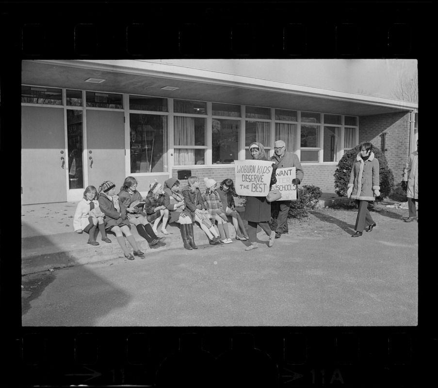 Striking Woburn teachers on picket line at Malcolm S. White Elementary