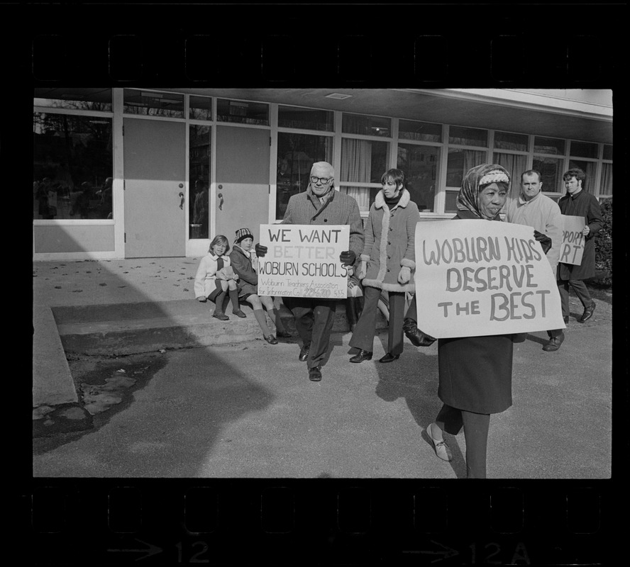 Striking Woburn teachers on picket line at Malcolm S. White Elementary