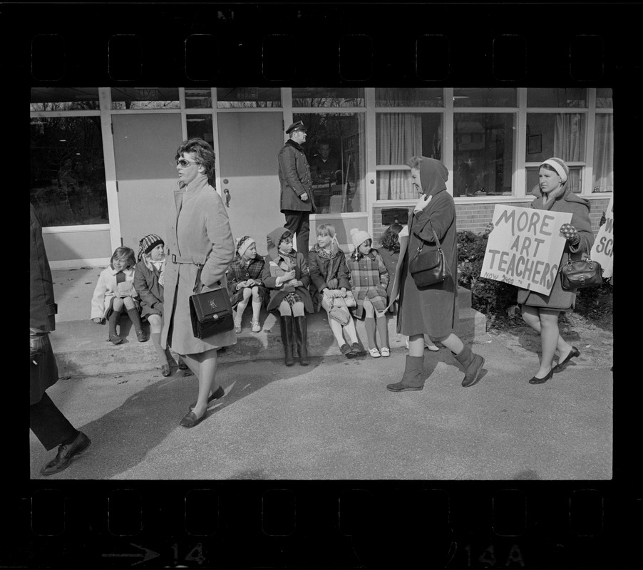 Striking Woburn teachers on picket line at Malcolm S. White Elementary
