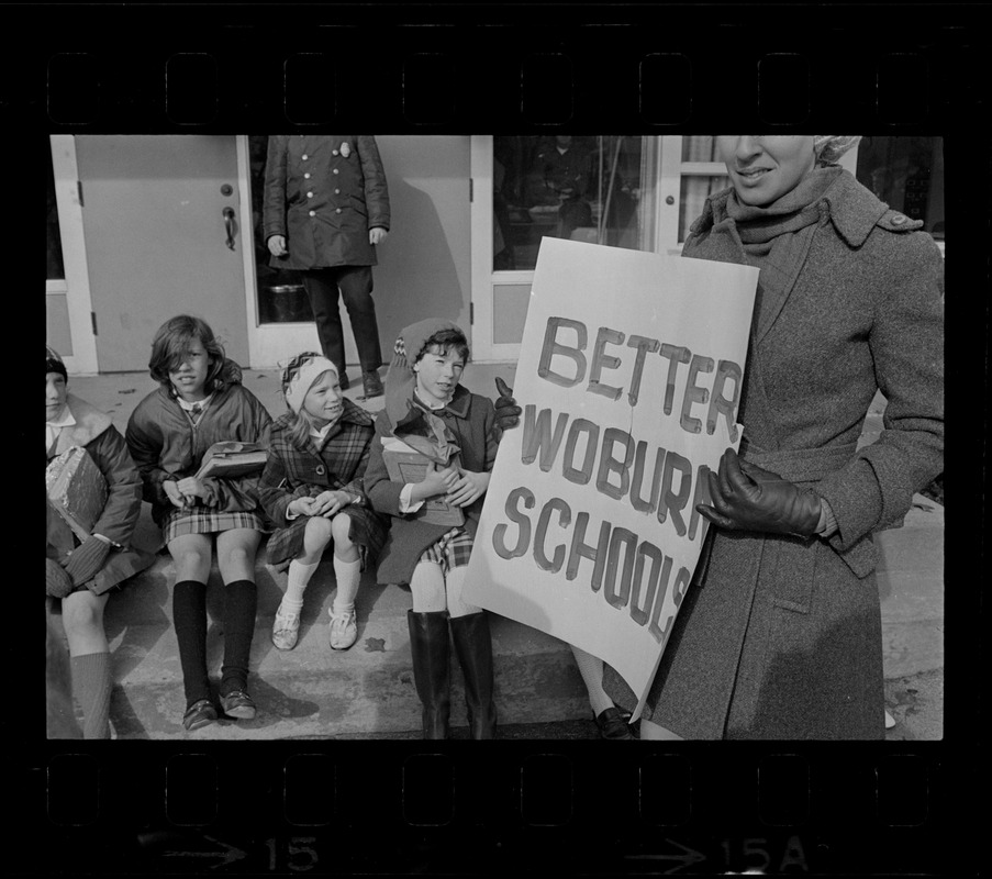 Striking Woburn teachers on picket line at Malcolm S. White Elementary