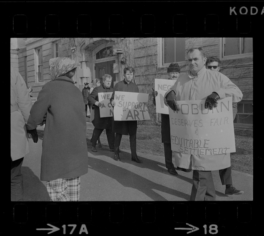 Striking teachers on picket line at Woburn High School Digital
