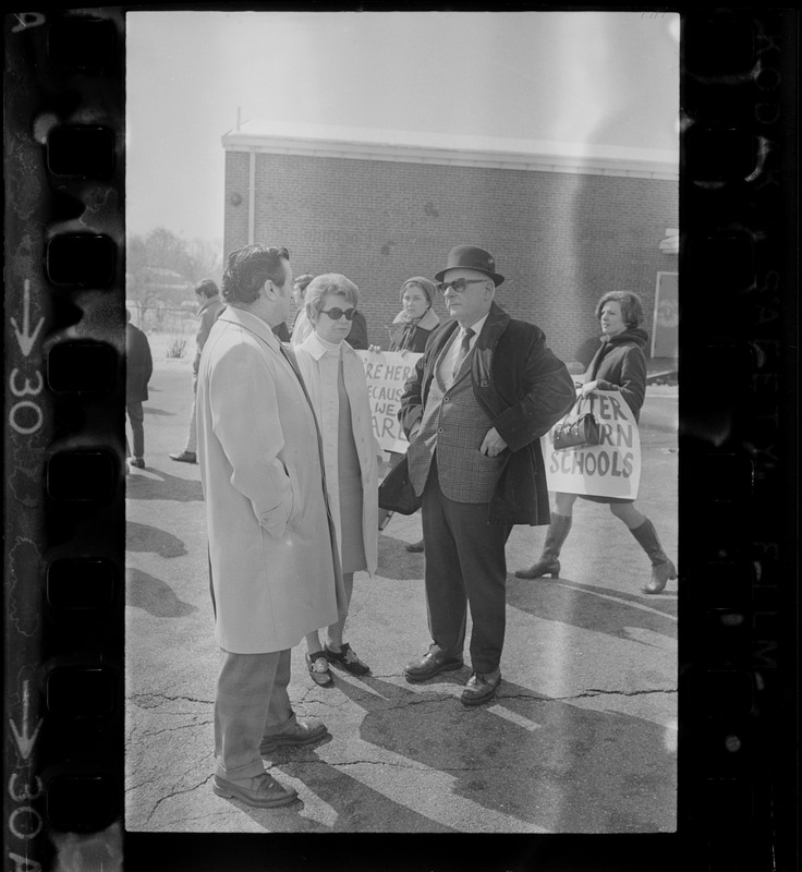 City Solicitor Charles DiPanfilo, Woburn School Committee Chairman Marilyn Finnerty and unidentified man visit teachers' picket line at Malcolm S. White Elementary School