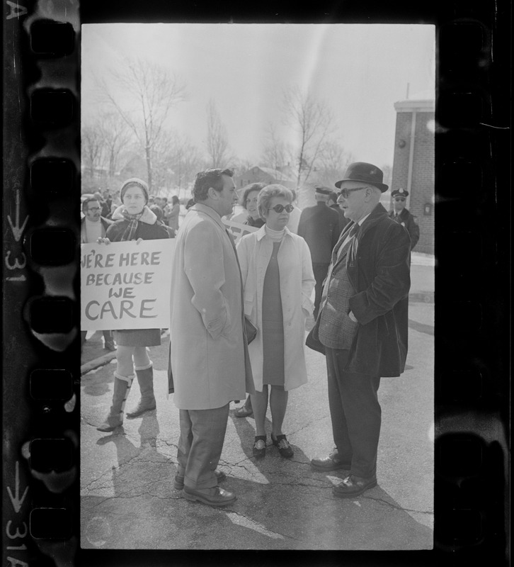 City Solicitor Charles DiPanfilo, Woburn School Committee Chairman Marilyn Finnerty and unidentified man visit teachers' picket line at Malcolm S. White Elementary School