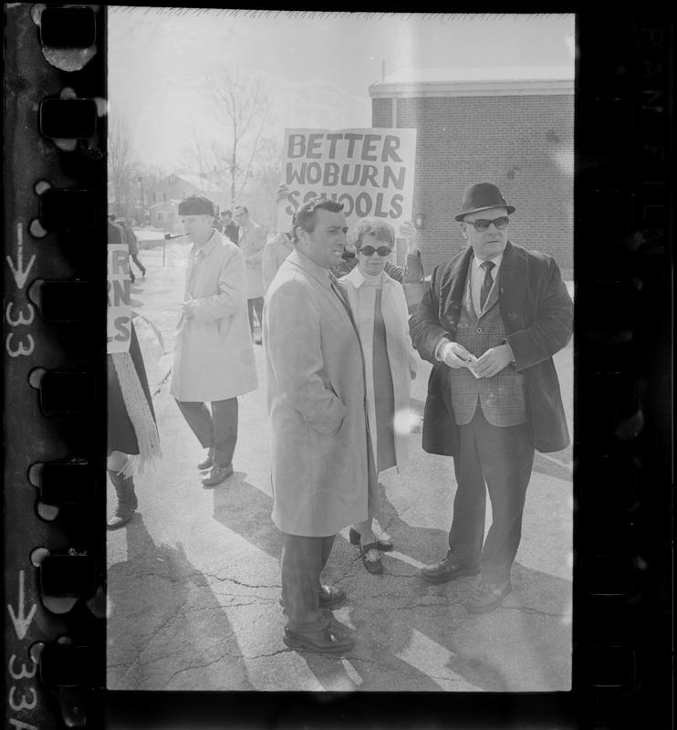 City Solicitor Charles DiPanfilo, Woburn School Committee Chairman Marilyn Finnerty and unidentified man visit teachers' picket line at Malcolm S. White Elementary School