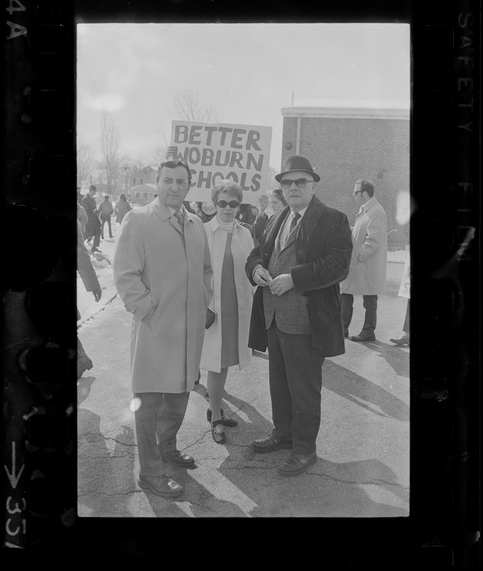 City Solicitor Charles DiPanfilo, Woburn School Committee Chairman Marilyn Finnerty and unidentified man visit teachers' picket line at Malcolm S. White Elementary School