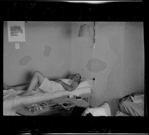 Unidentified man lying on bed, Eilat, Israel