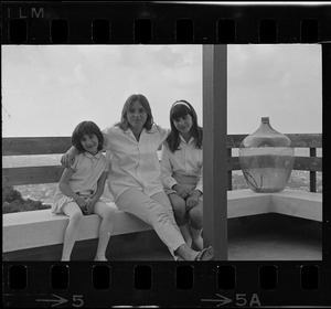 Woman and girls posing on patio, Israel