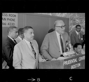 Dr. Eugene Reed and unidentified man, possibly Donald F. Lee, addressing NAACP National Convention