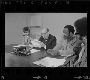 Judge Elwood McKenney, Superior Court Justice Walter H. McLaughlin, and unidentified man at conference at Roxbury courthouse to discuss crime in the black community