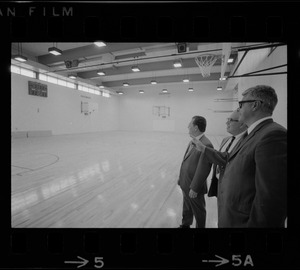 New gym at the West End House Boys' Club is inspected by (from left) executive director Joseph Palladino, past president Charles Merrick, and corporation clerk Michael Cataldo