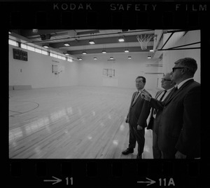 New gym at the West End House Boys' Club is inspected by (from left) executive director Joseph Palladino, past president Charles Merrick, and corporation clerk Michael Cataldo