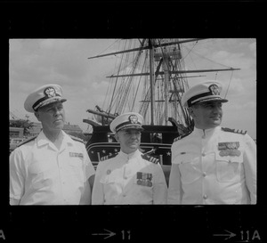 Rear Admiral Joseph C. Wylie, Commander Jack L. Reifschneider, and Commander Hugh Moore