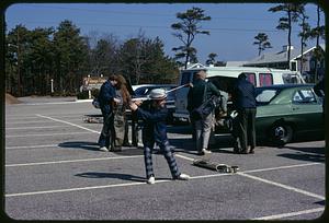 Golfers in parking lot