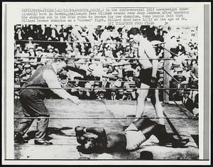In the controversial 1915 heavyweight championship bout in Havana, challenger Jess Willard stands over Jack Johnson after knocking the champion out in the 26th round to become the new champion. Some people felt that Willard became the new champion on a "thrown" fight. Willard died here 12/15 at the age of 86.