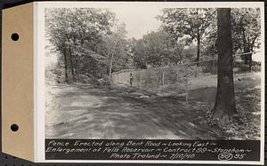 Contract No. 99, Enlargement of Fells High Level Distribution Reservoir, Stoneham, Malden, Melrose, fence erected along Bent Road, looking east, enlargement of Fells Reservoir, Stoneham, Mass., Jul. 10, 1940