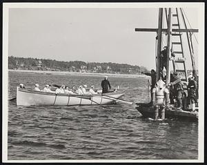 New [illegible] Toms River, N.J.- Cadets of [illegible] Academy watch as new diving suit is [illegible] the feasibility of using a mixture of [illegible] oxygen for deep sea diving. The experiment was made by Cyril Von Baumann, traveler, writer and explorer, before students and faculty members of the Naval Academy. Mr. Von Baumann used a new 1100-pound diving suit in which the diver alone controls the amount of air by manipulation of the valves of the tanks he carries with his. The suit is the invention of Capt. Tom Connely.