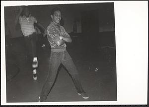 Teenage boy striking a pose